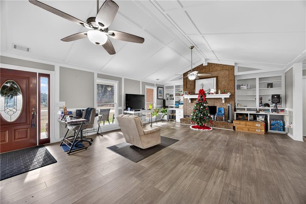 505 Stone Road McDonough, GA 30253 - Photo 9 of 28 a living room with furniture and a wooden floor