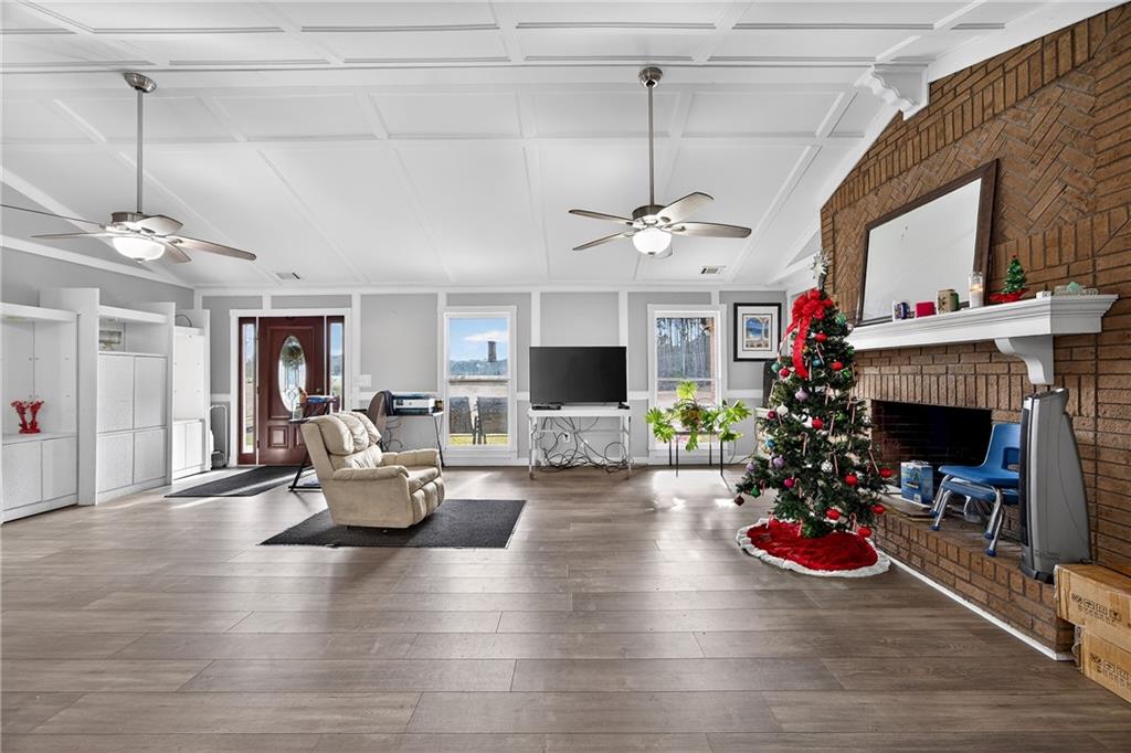 505 Stone Road McDonough, GA 30253 - Photo 10 of 28 a living room with furniture fireplace and a flat screen tv