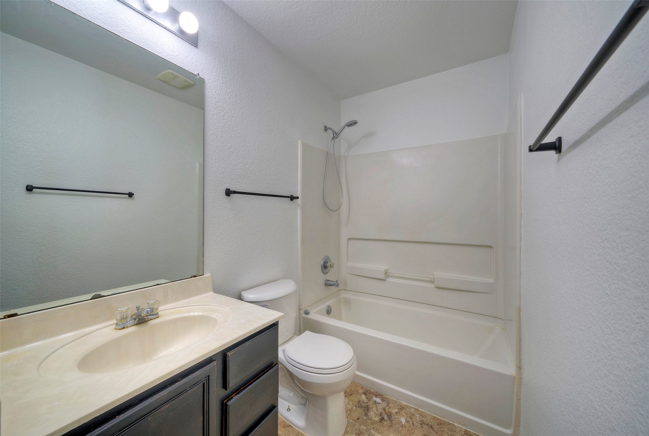 140 Plum Path Kyle, TX 78640 - Photo 14 of 22 a bathroom with a sink a toilet and shower