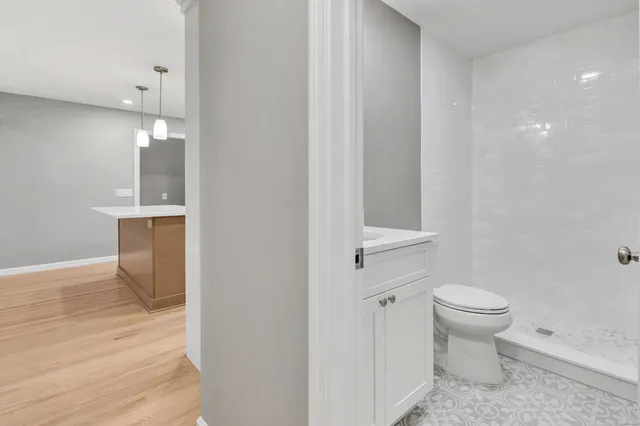 a bathroom with a toilet and a sink