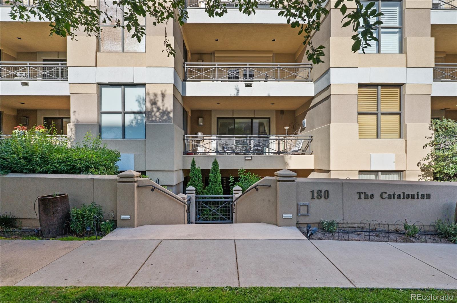 180 Cook Street, Unit 203 Denver, CO 80206 - Photo 7 of 44 front view of house with a yard