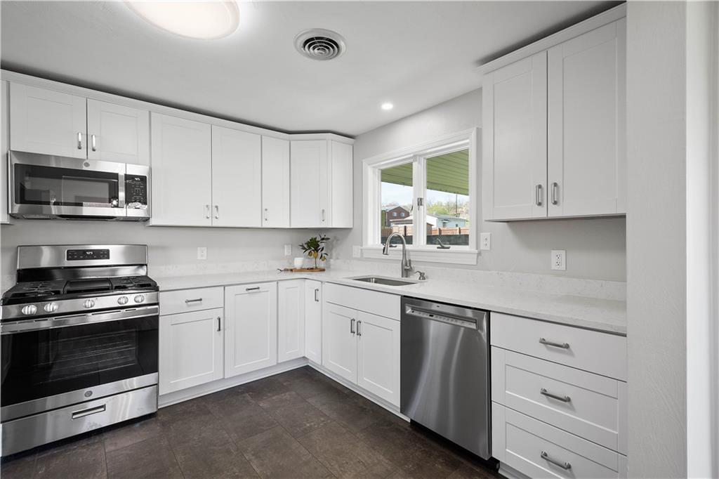 916 McGovern Road Houston, PA 15342 - Photo 19 of 44 The brand-new stainless steel appliances include an over the range microwave, dishwasher, refrigerator and a gas stove!