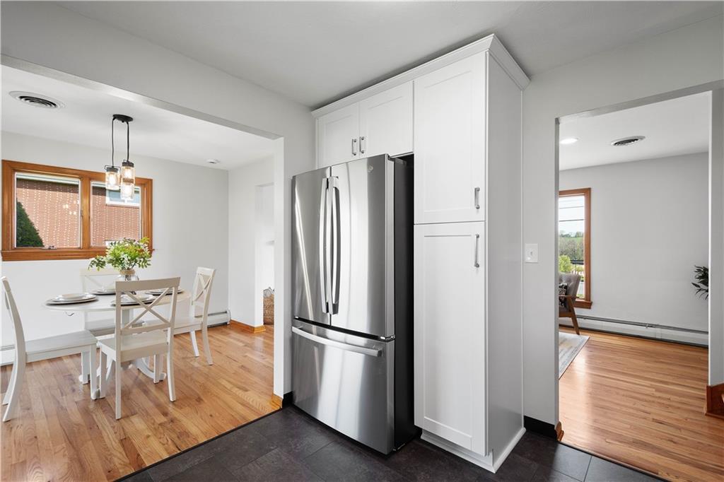 916 McGovern Road Houston, PA 15342 - Photo 20 of 44 The stainless steel refrigerator and custom pantry design makes the perfect addition to this beautifully designed kitchen space.
