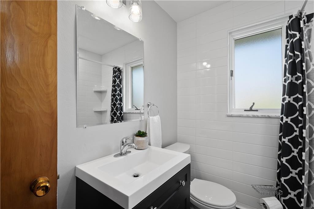 916 McGovern Road Houston, PA 15342 - Photo 31 of 44 Modern fixtures make this stunning bathroom renovation shine!