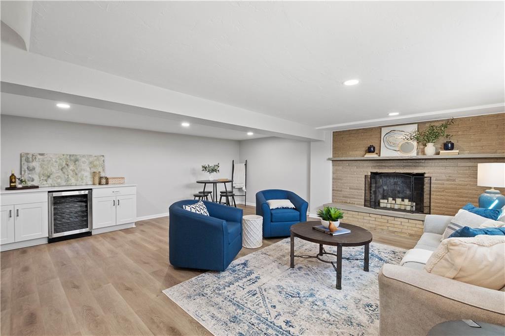 916 McGovern Road Houston, PA 15342 - Photo 35 of 44 Enjoy hosting friends in family in this swoon worthy space complete with a quartz countertop bar and wine fridge.