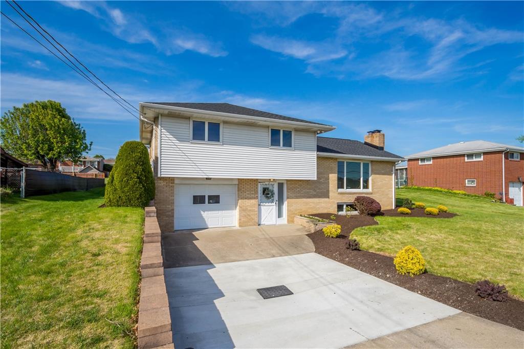 916 McGovern Road Houston, PA 15342 - Photo 4 of 44 Professionally renovated home with a new roof, new sewer line and updated landscaping for beautiful curb appeal!