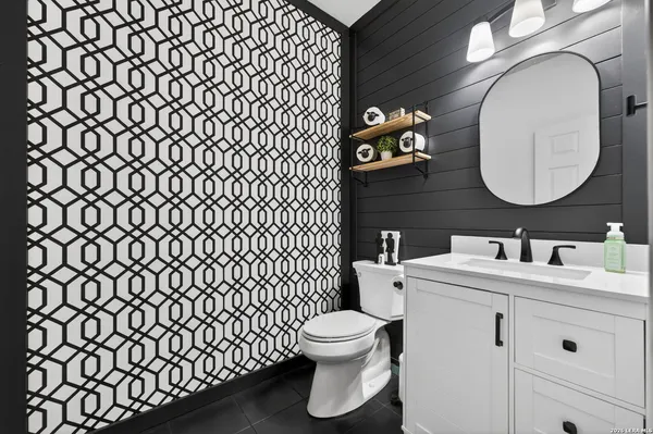 a bathroom with a toilet and a sink