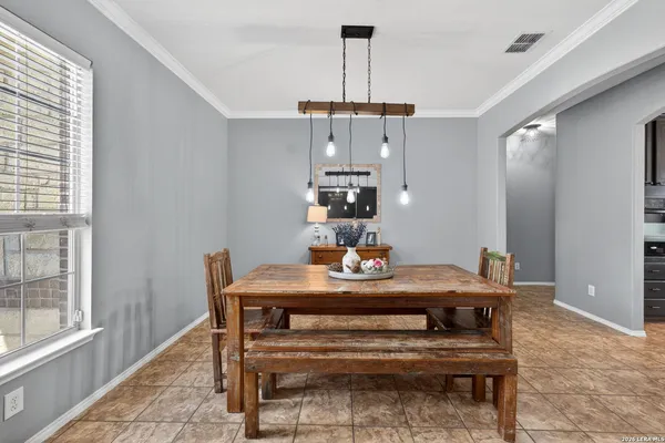 a view of a dining room with furniture