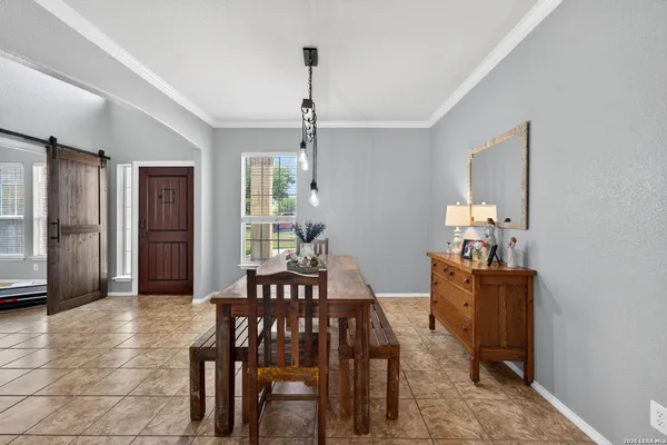 a view of a dining room with furniture