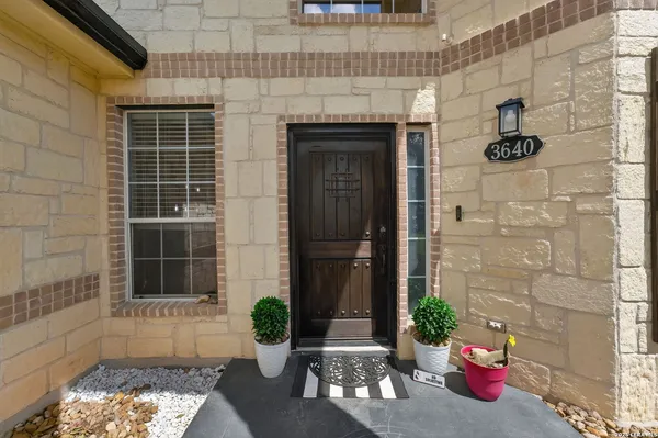 a front view of a house with an outdoor space