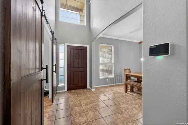 a view of livingroom with furniture and windows