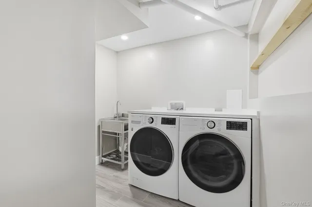 a utility room with dryer and washer