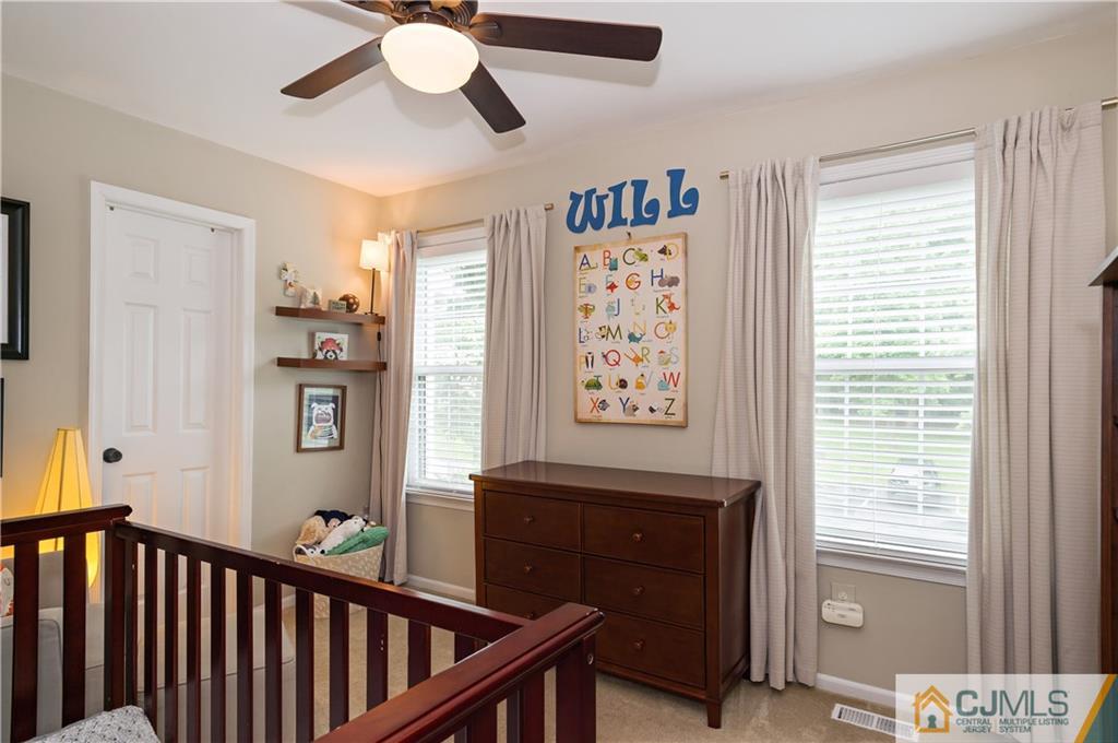 2406 Timber Oaks Road, Unit 2406 Edison, NJ 08820 - Photo 22 of 24 a view of entryway with furniture and windows