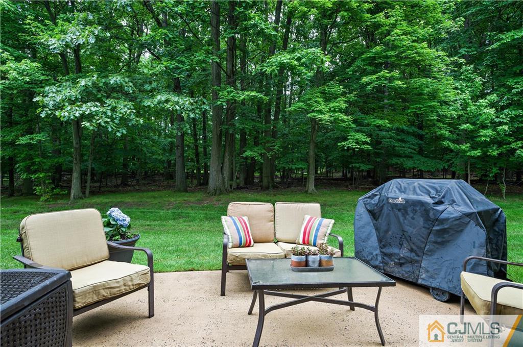 2406 Timber Oaks Road, Unit 2406 Edison, NJ 08820 - Photo 24 of 24 a garden view with a seating space