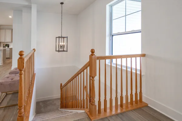 a view of a hallway with windows