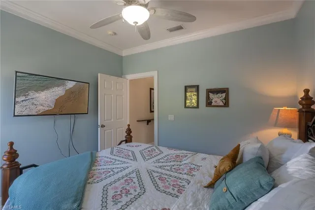 a bathroom with a sink a toilet a mirror and shower