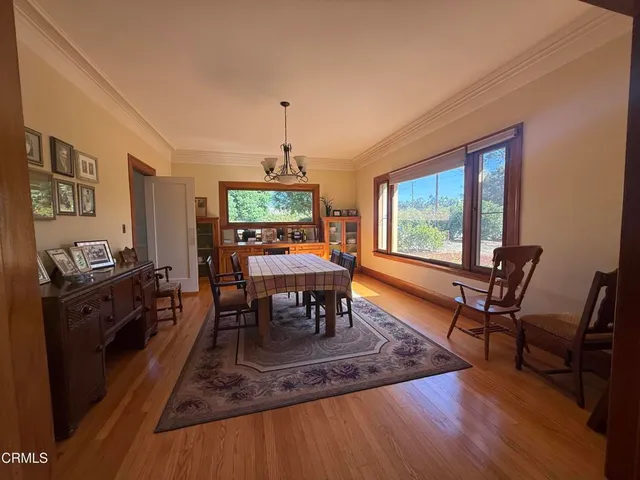 a bedroom with a bed and a table in it