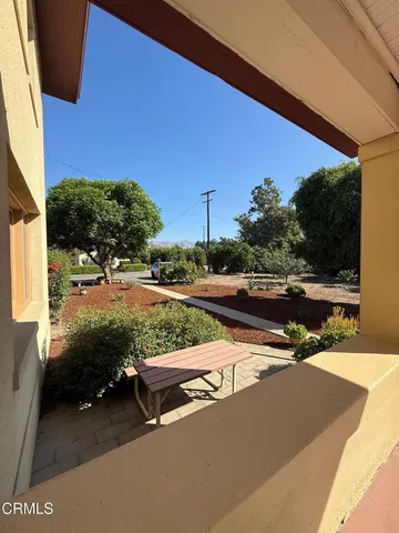 a view of a road with a yard