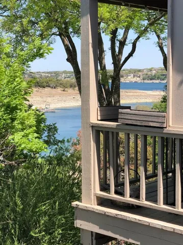 a view of a garden from a balcony