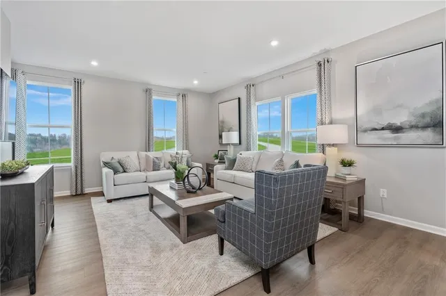 a spacious bedroom with a bed and a large mirror