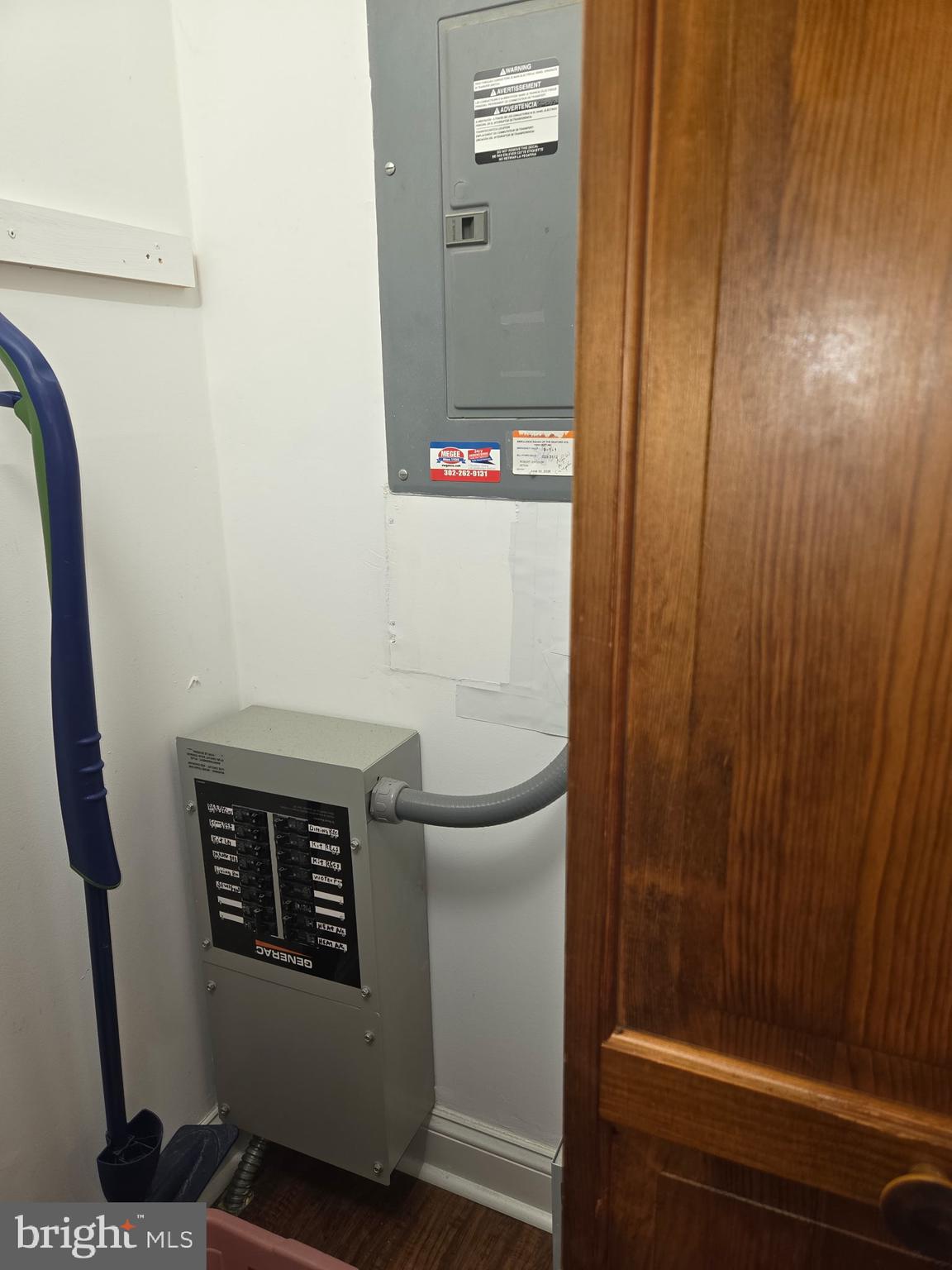 10958 Pit Road Seaford, DE 19973 - Photo 13 of 39 Backup Generator / Electric Panel