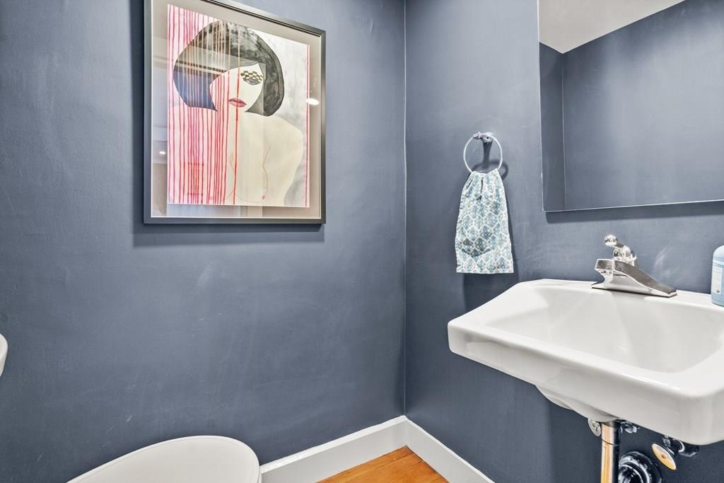 24 Cedarwood Road Boston, MA 02130 - Photo 15 of 18 a bathroom with a sink mirror and toilet