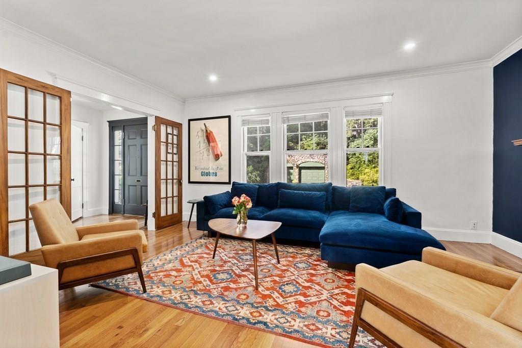 24 Cedarwood Road Boston, MA 02130 - Photo 2 of 18 a living room with furniture and a large window