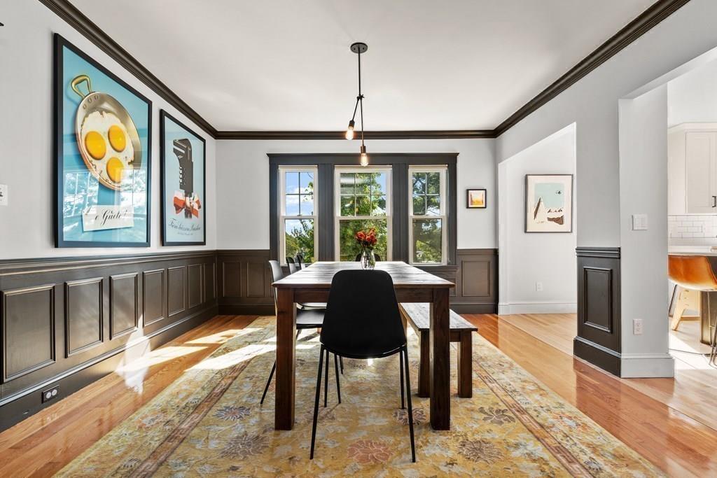24 Cedarwood Road Boston, MA 02130 - Photo 8 of 18 a dining room with furniture a chandelier and wooden floor