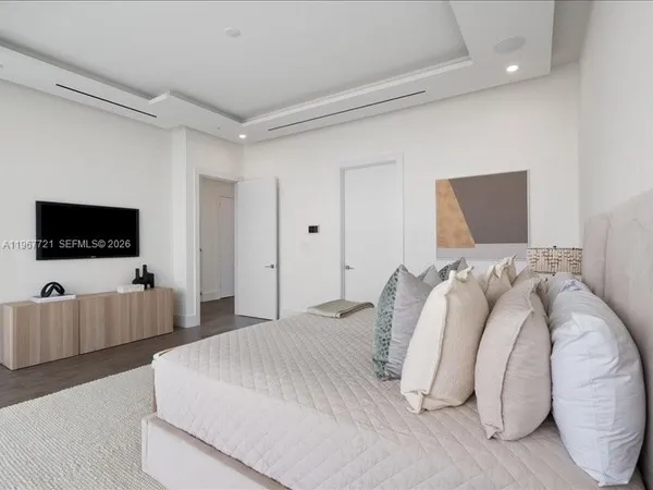 a living room with a large window and table