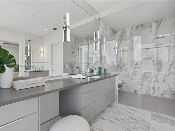 a view of a living room with flat screen tv