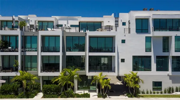 a front view of a building with a glass door