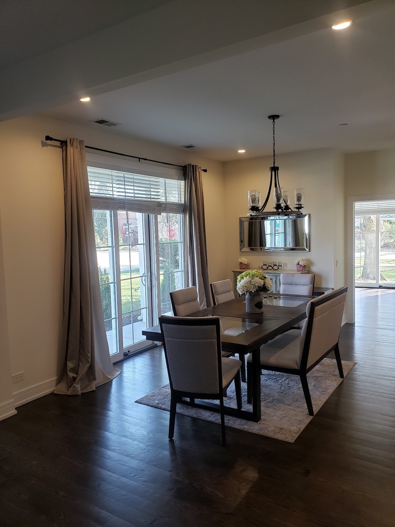 3101 Sprucewood Road Wilmette, IL 60091 - Photo 3 of 10 a view of a dining room with furniture window and wooden floor