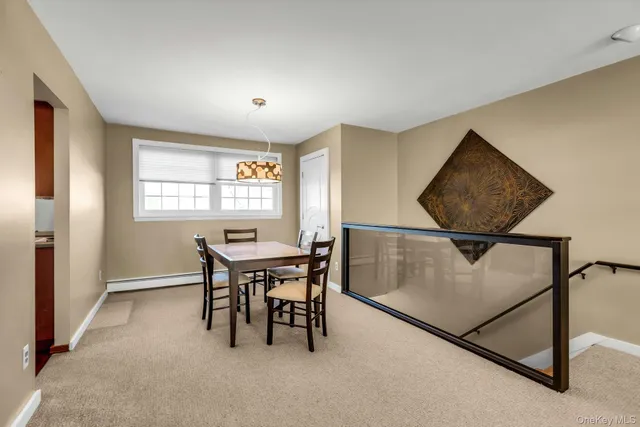 a workspace with furniture and window