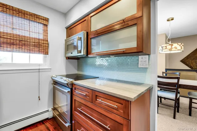 a utility room with washer and dryer