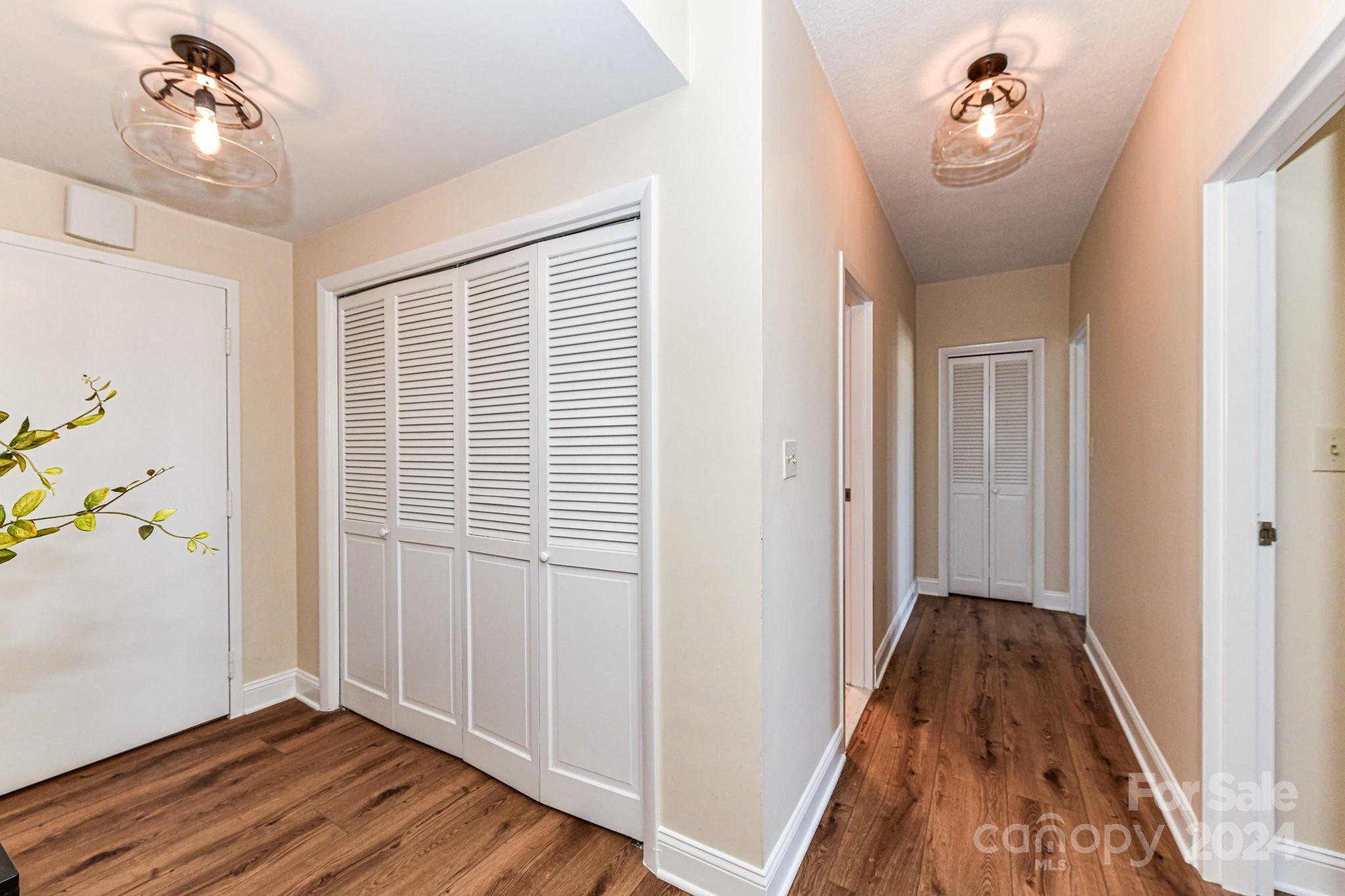 1300 Reece Road, Unit 415 Charlotte, NC 28209 - Photo 17 of 32 wooden floor in a gallery
