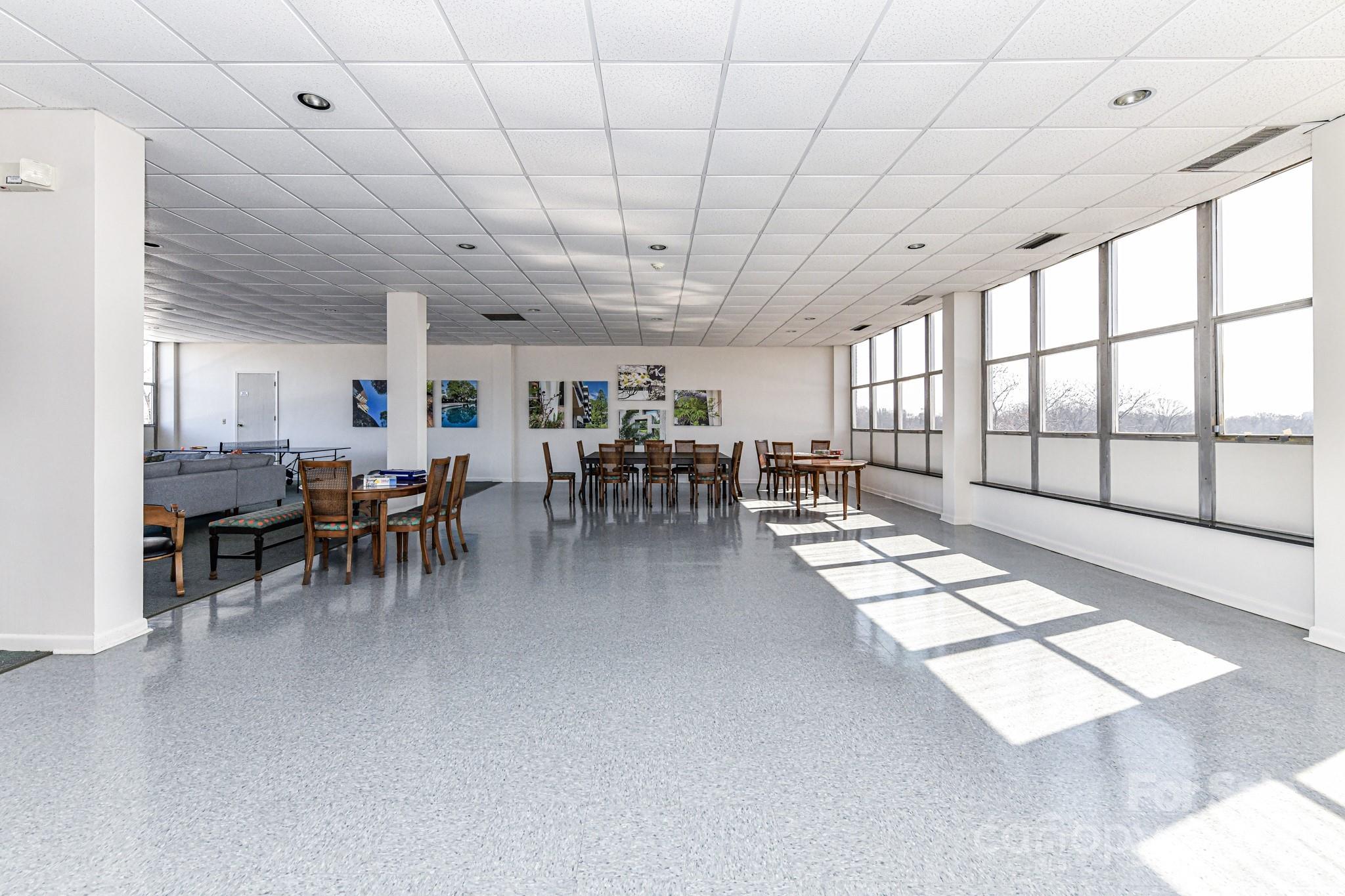 1300 Reece Road, Unit 415 Charlotte, NC 28209 - Photo 30 of 32 a group of people sitting in room