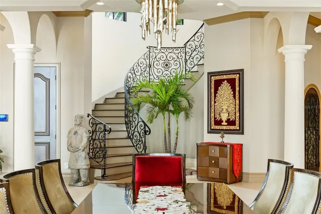 a kitchen with granite countertop a stove and a refrigerator