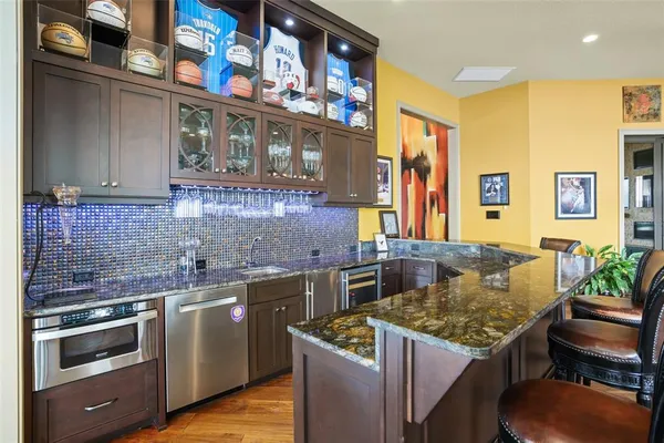 a view of a livingroom with furniture and a window