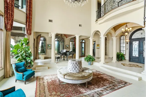 a dining room with furniture and window