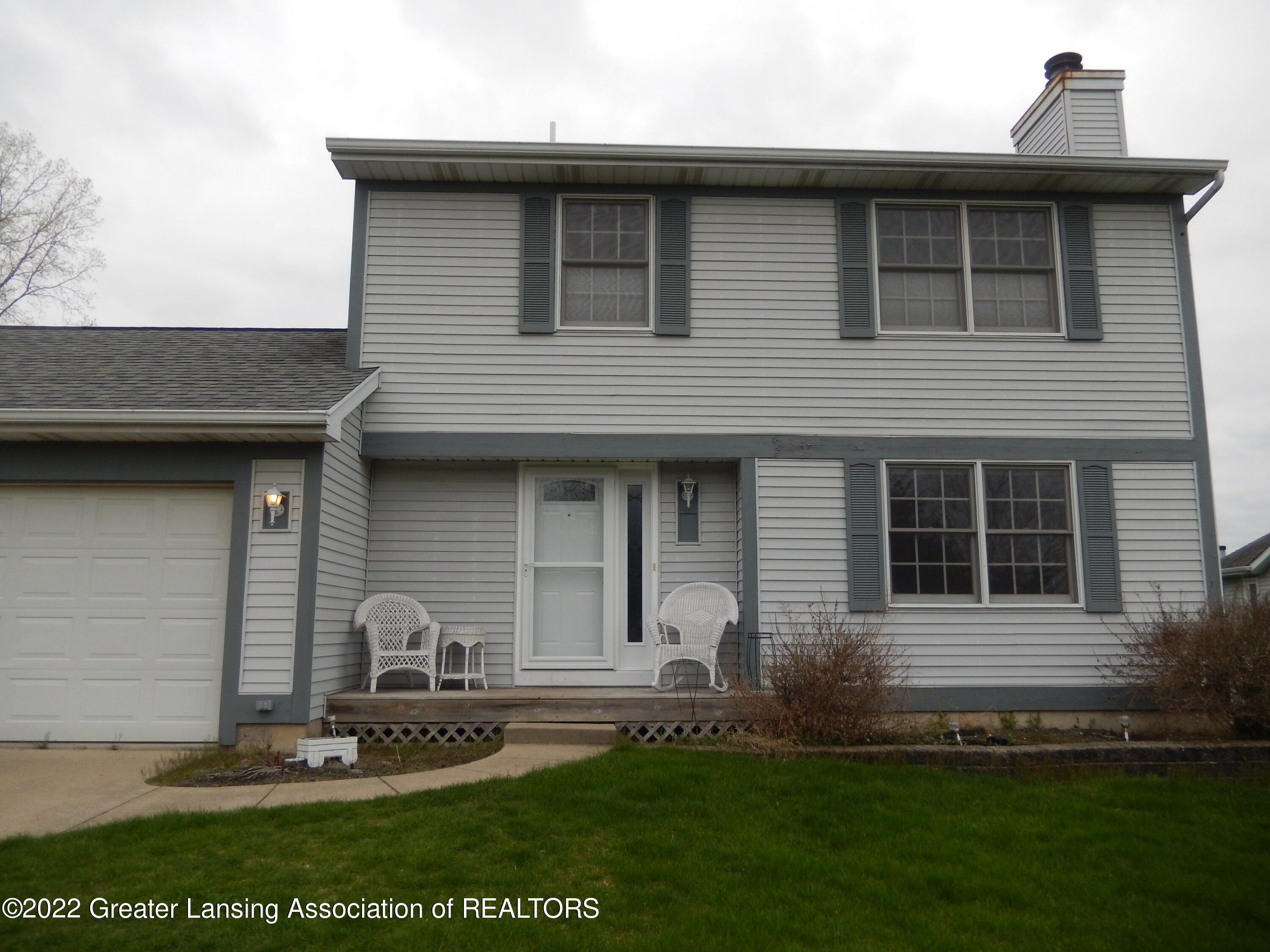 2350 Pine Tree Road Holt, MI 48842 - Photo 1 of 26 front