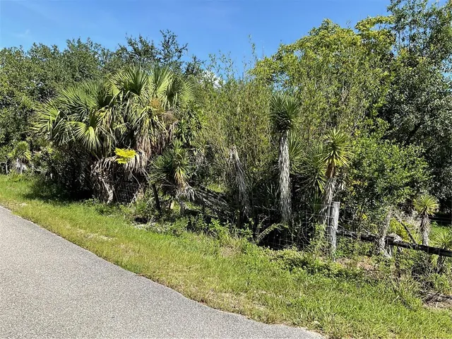 a view of a wooden fence