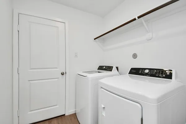 a utility room with dryer and washer