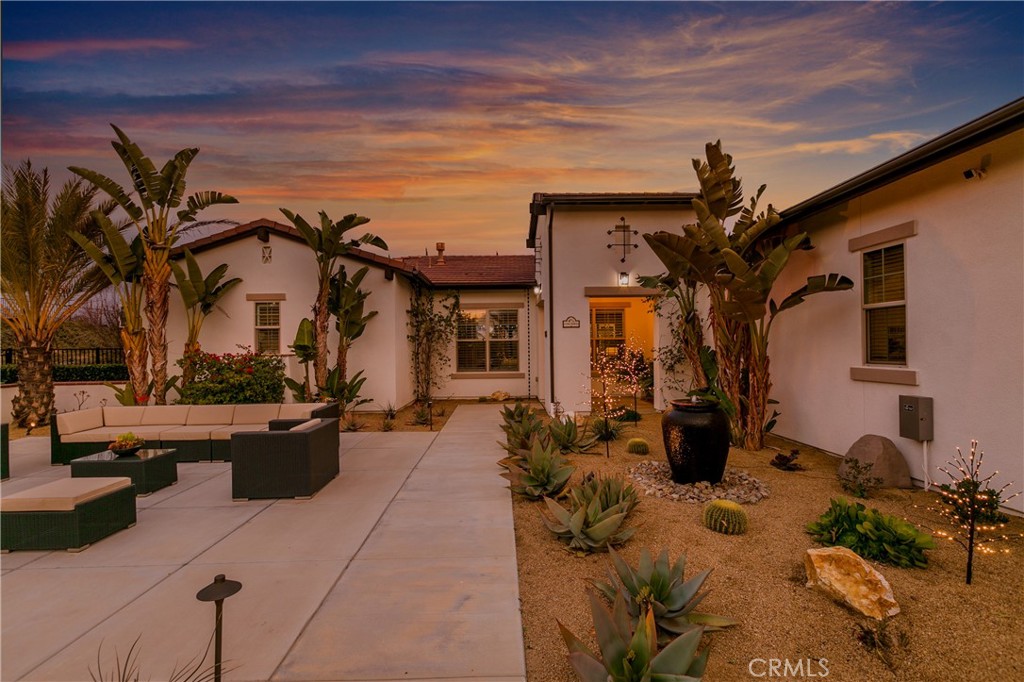1769 Green Orchard Place Riverside, CA 92508 - Photo 1 of 1 a view of a house with backyard and sitting area
