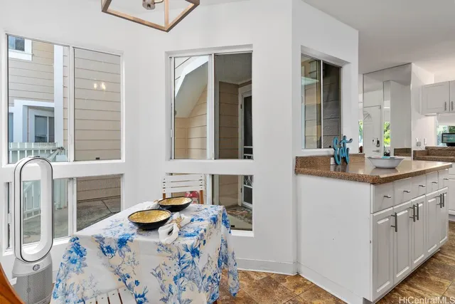 a bathroom with a sink double vanity and a mirror