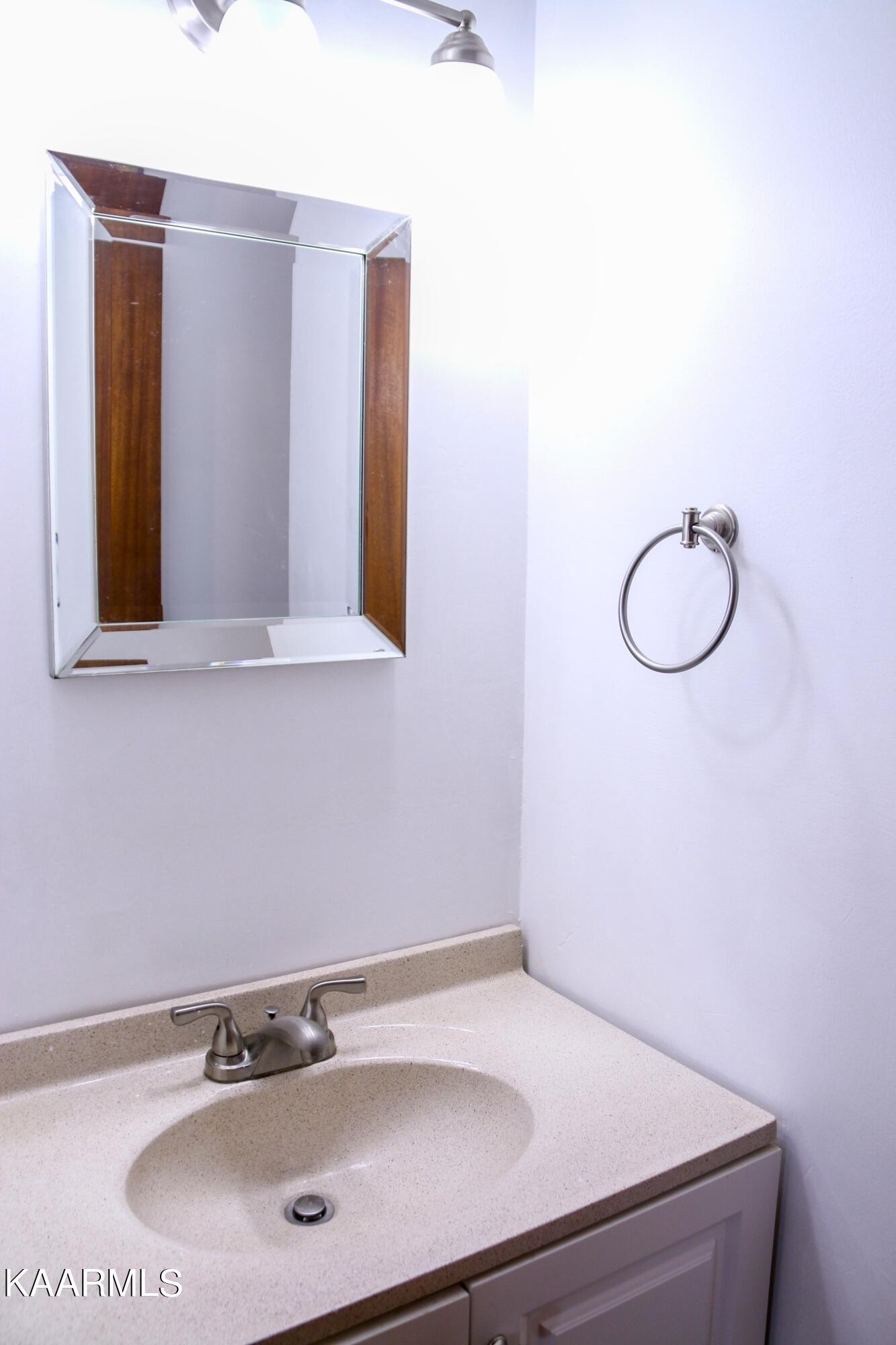 212 Kasson Road Knoxville, TN 37920 - Photo 11 of 22 a bathroom with a sink and a mirror