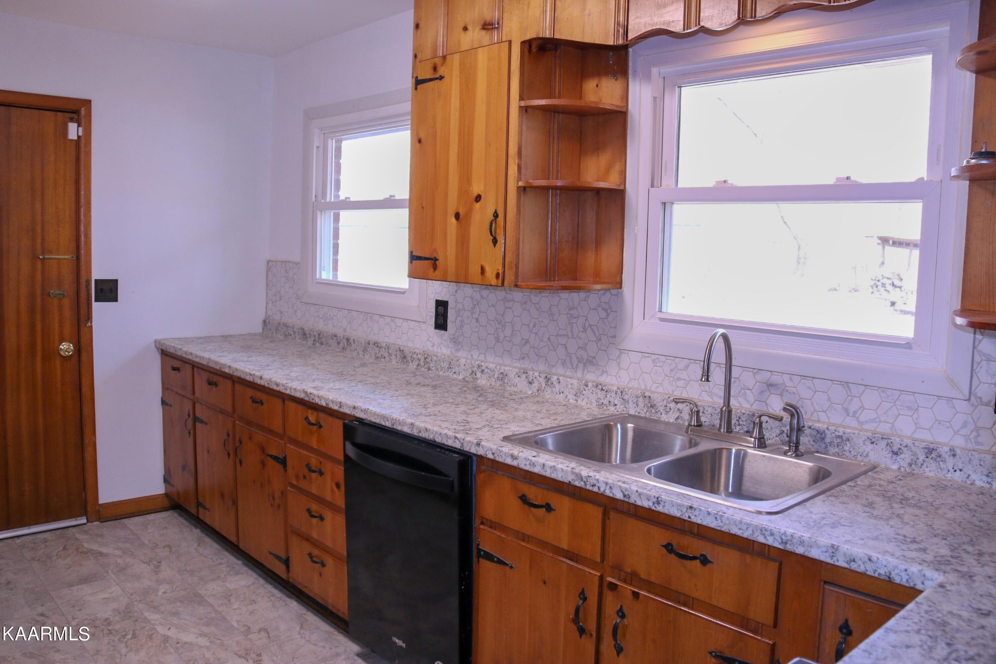 212 Kasson Road Knoxville, TN 37920 - Photo 4 of 22 a bathroom with a sink double vanity and a mirror