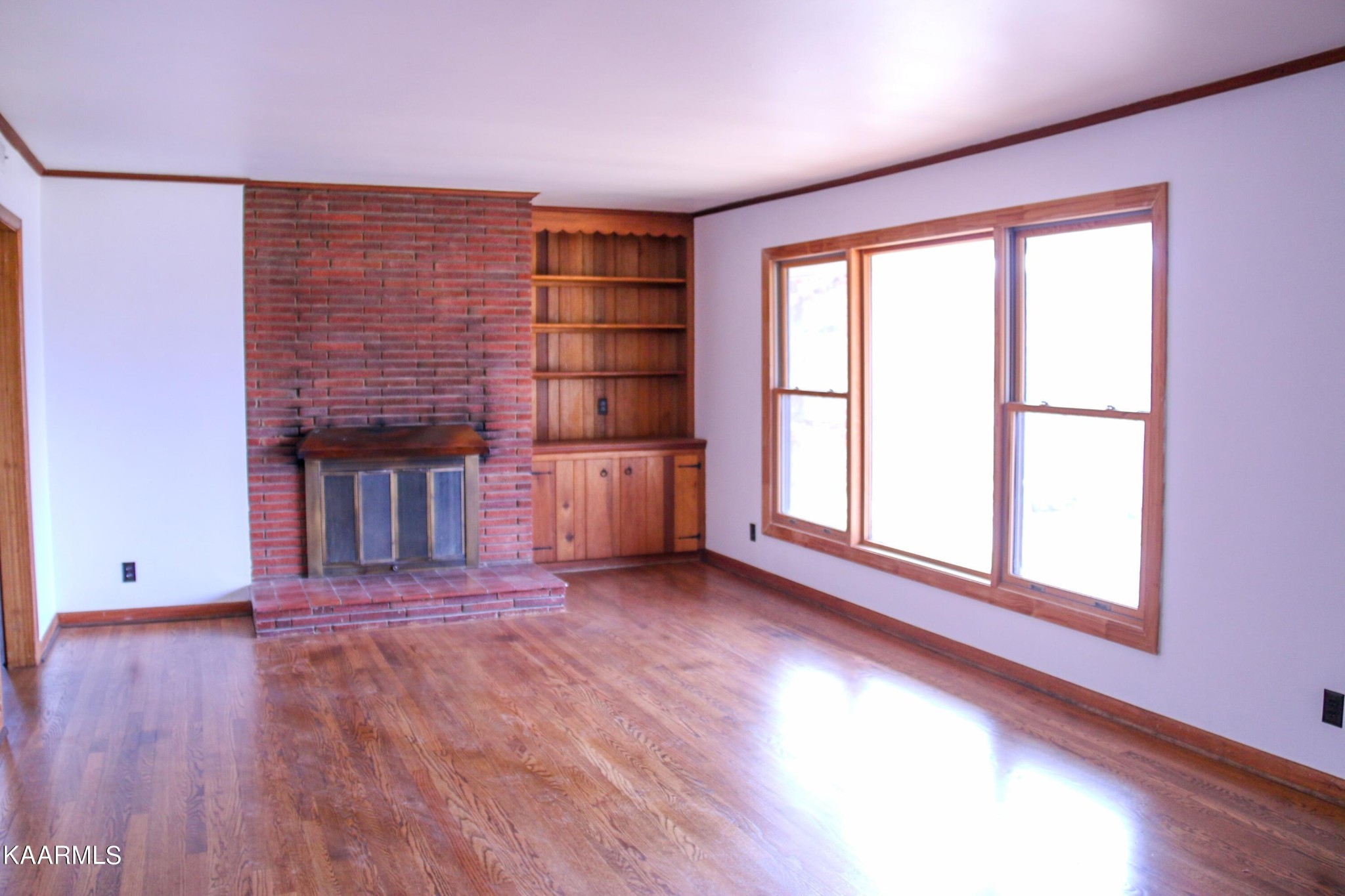 212 Kasson Road Knoxville, TN 37920 - Photo 6 of 22 wooden floor in an empty room with a window