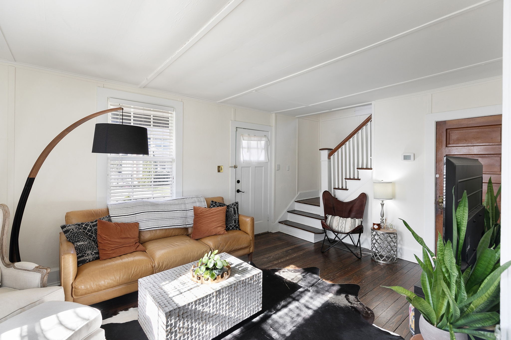1409 Overton Street Old Hickory, TN 37138 - Photo 11 of 33 a living room with furniture a table and a potted plant