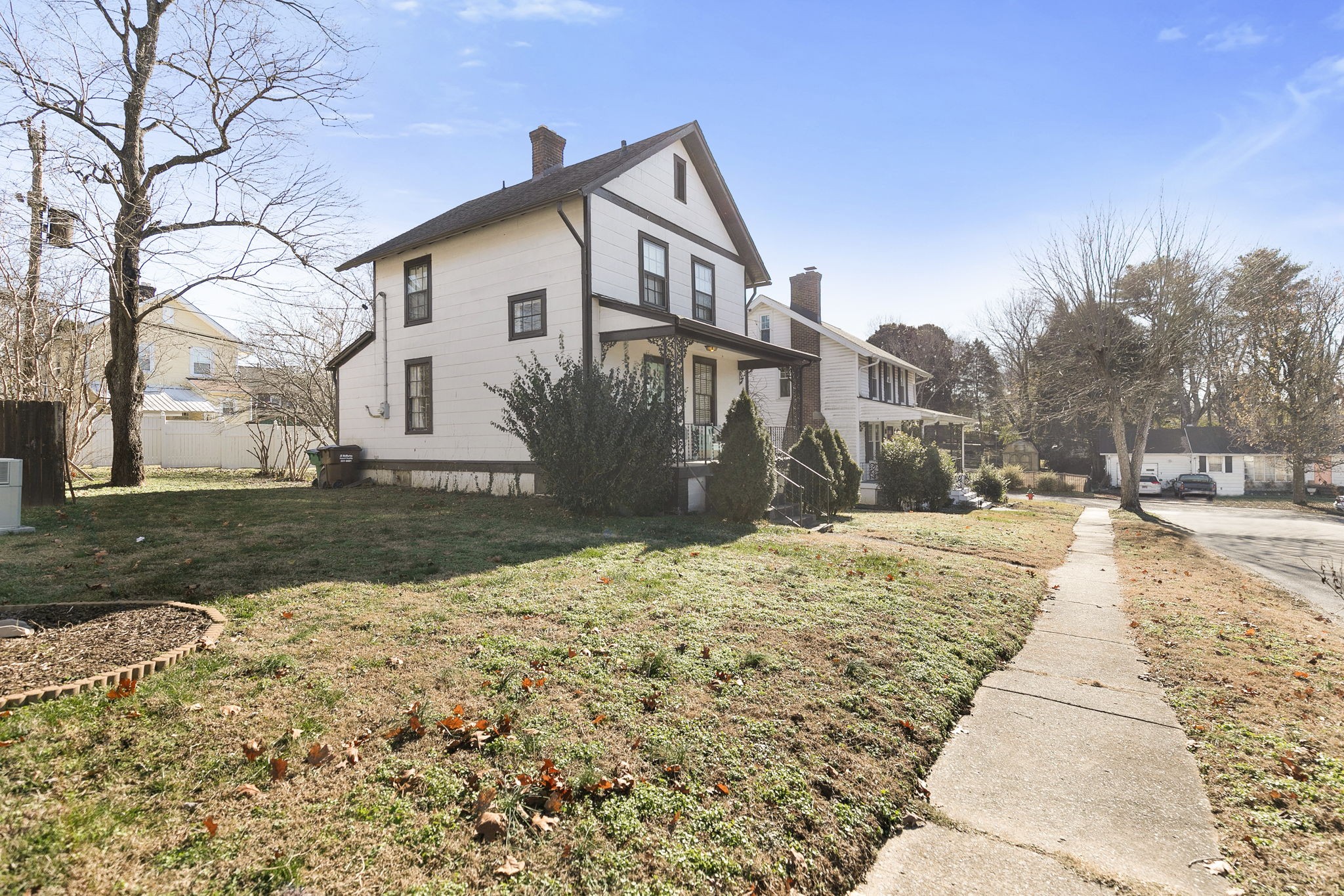 1409 Overton Street Old Hickory, TN 37138 - Photo 31 of 33 a view of a white house with a yard covered in snow