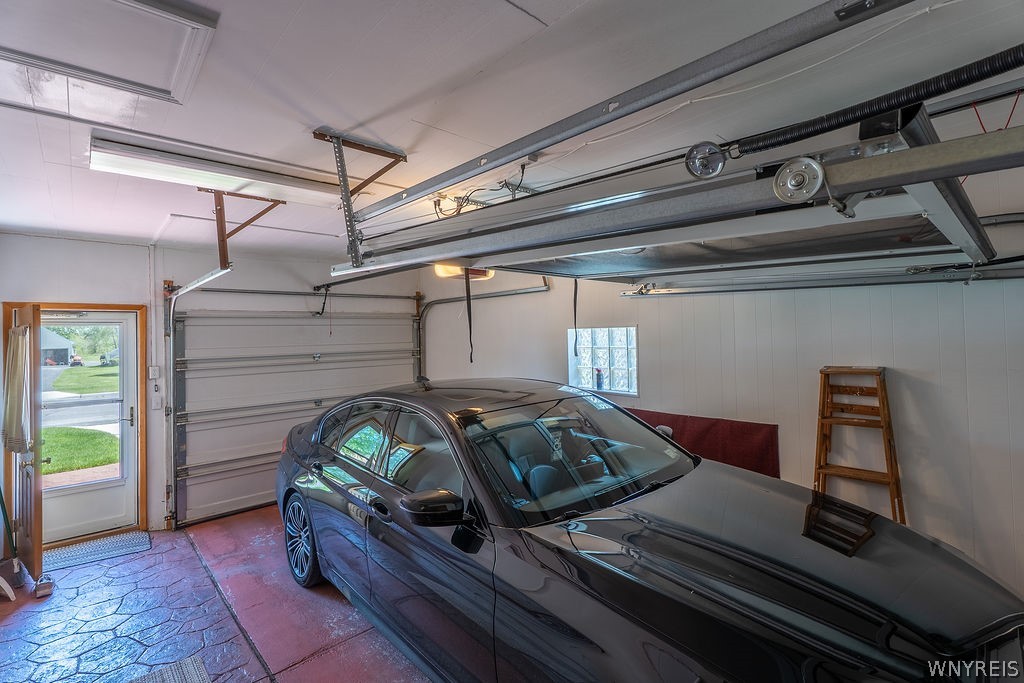 638 Borden Road Cheektowaga, NY 14227 - Photo 41 of 41 Deep 1 1/2 car garage with front and rear garage d